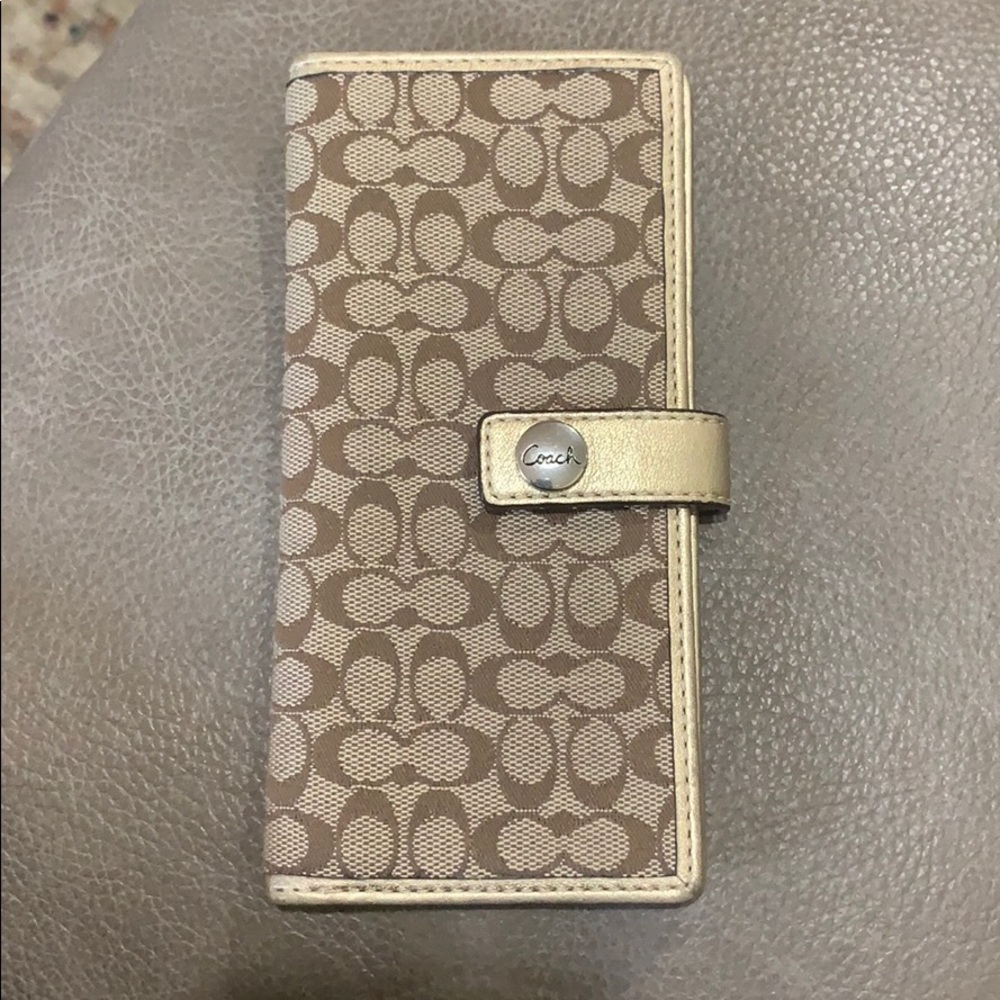 Coach gold brown and tan wallet with ID slot